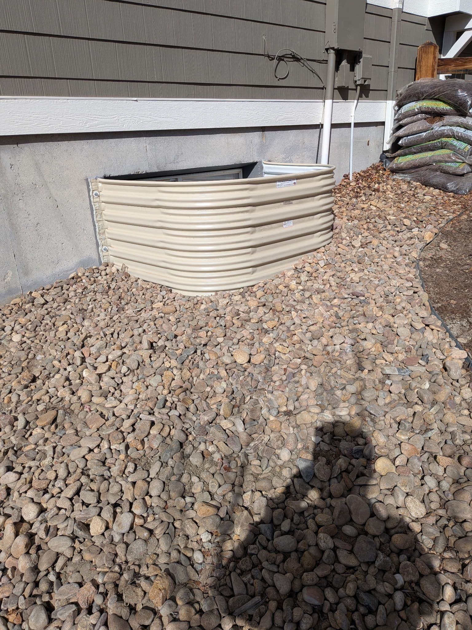Gallery photos for Galvanized Window Wells Covers and Colorado Landscaping Done Right: Image #2