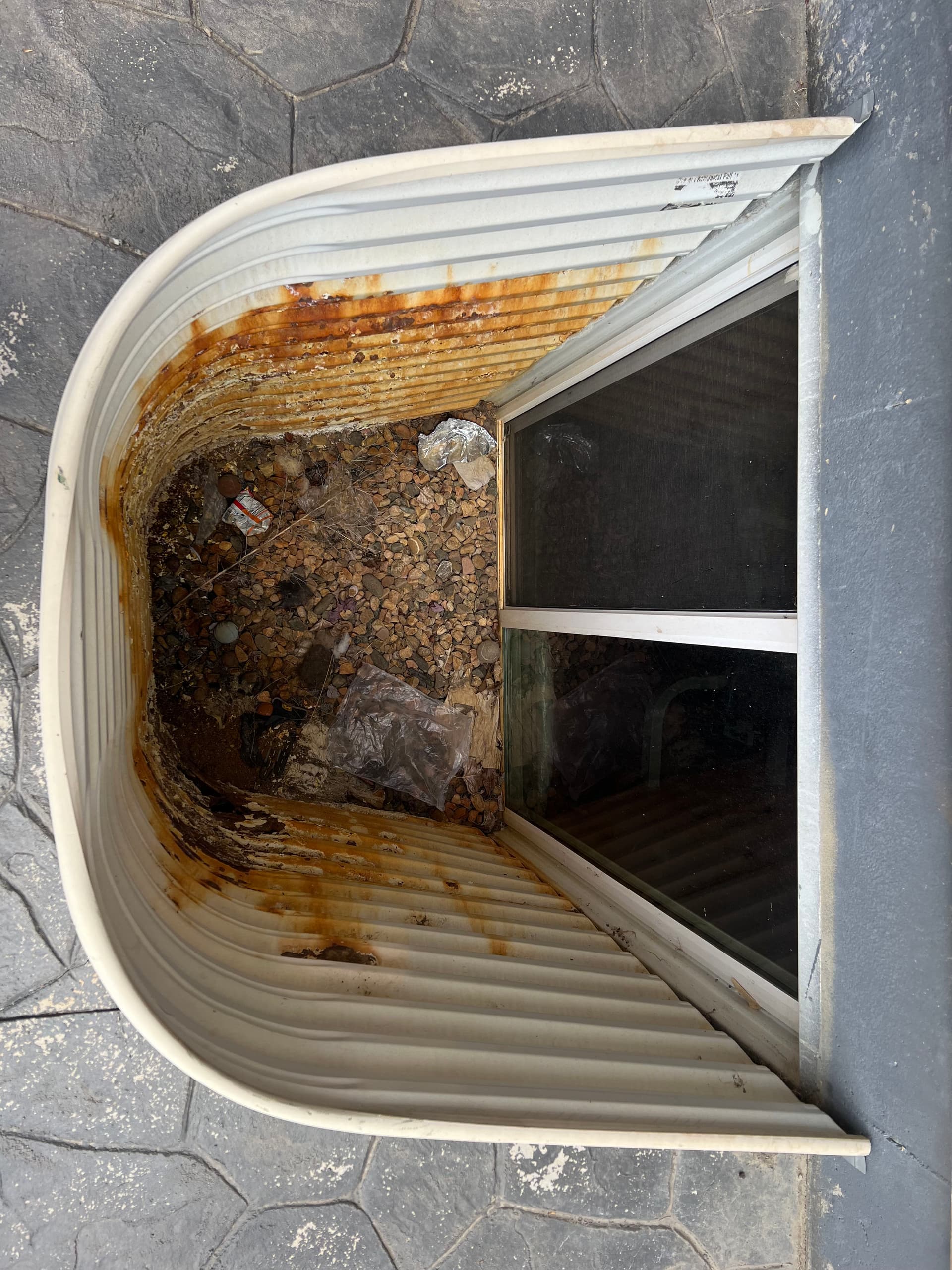 Gallery photos for Warning Signs Your Window Well Is Failing Before It Leaks: Image #1