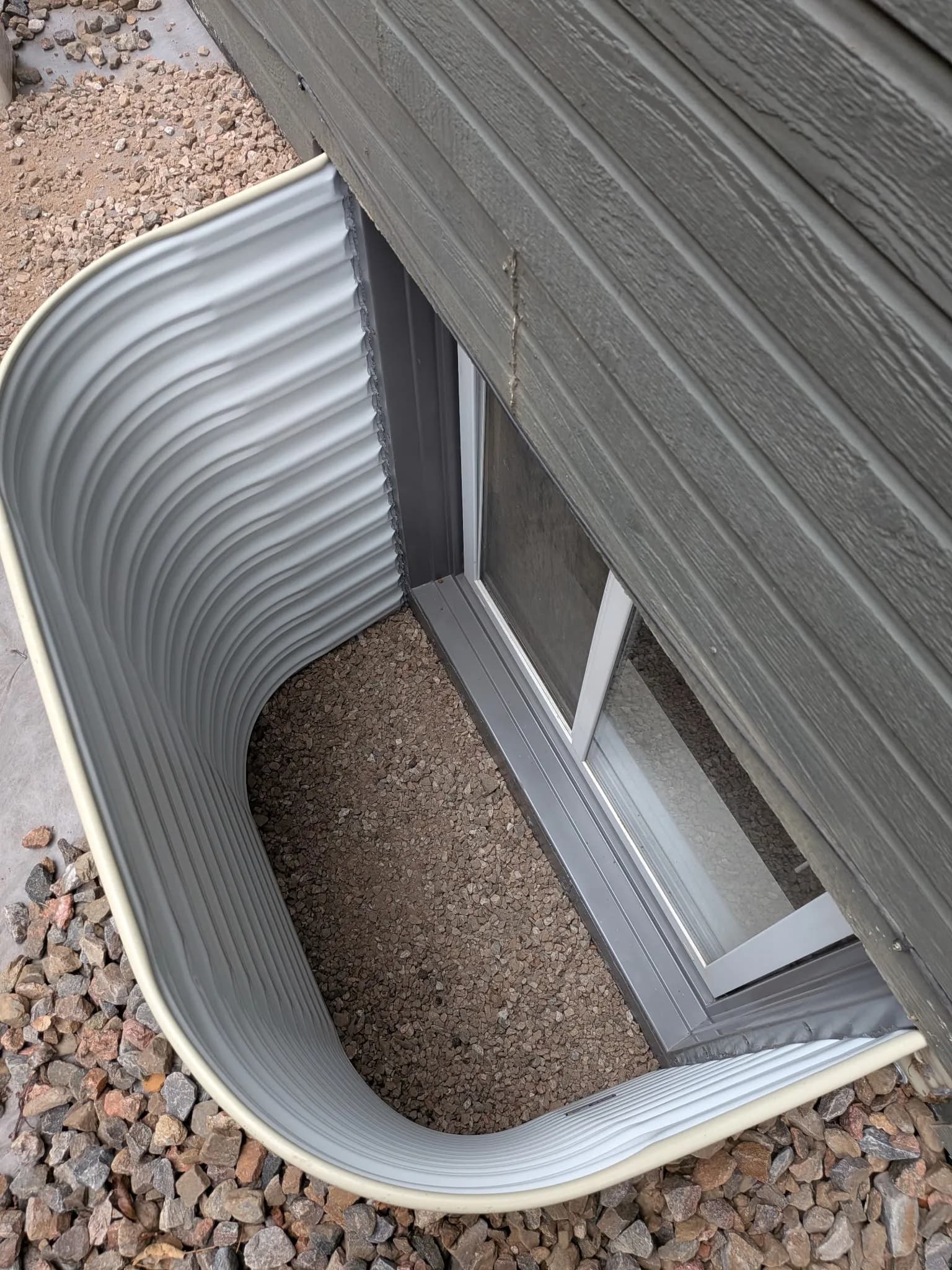 Your Window Well Might Be One Storm Away From a Real Problem