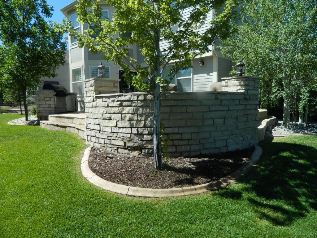 Backyard Transformation with Stone Patio and Fire Pit image