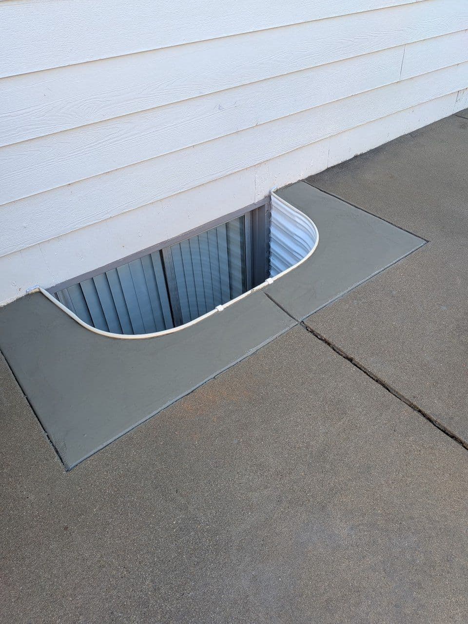 Gallery photos for Elevating Home Aesthetics with Seamless Window Well Installation: Image #3