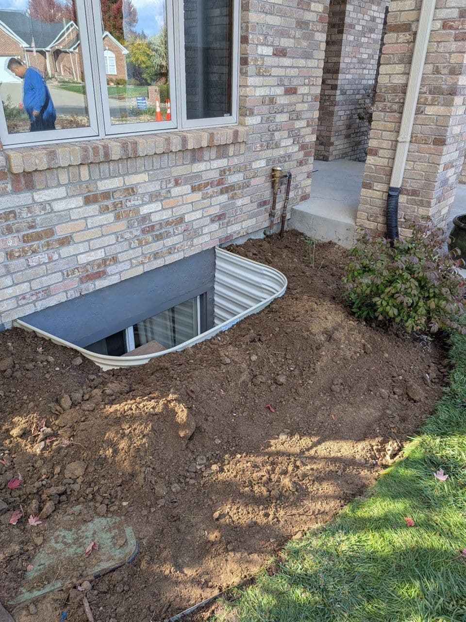 Gallery photos for Sturdy and Stylish Window Well Installation Transforms Homes: Image #3