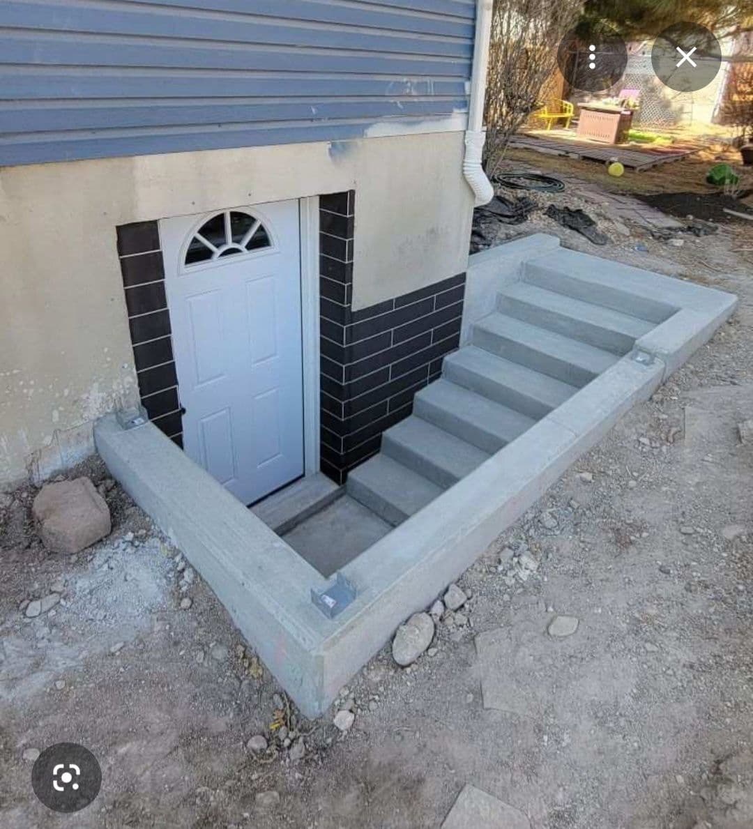 Gallery photos for Basement Stair Transformation with Retaining Walls: Image #2