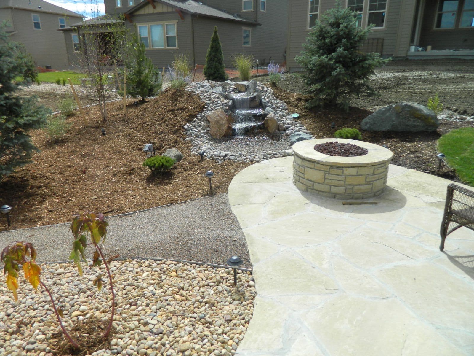 Gallery photos for Backyard Dreams Realized with Stunning Stone Fire Pit and Grill: Image #3