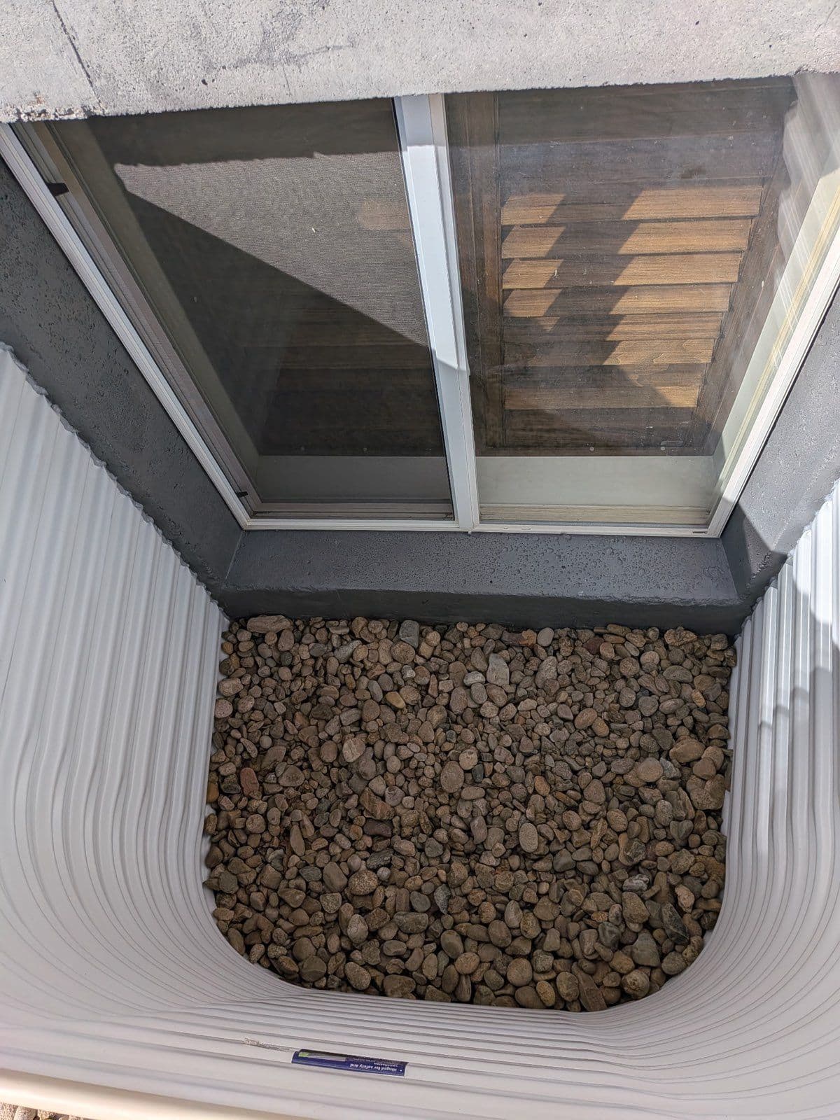 Gallery photos for Revamping Rusty Window Wells for a Safer Home in Colorado: Image #1