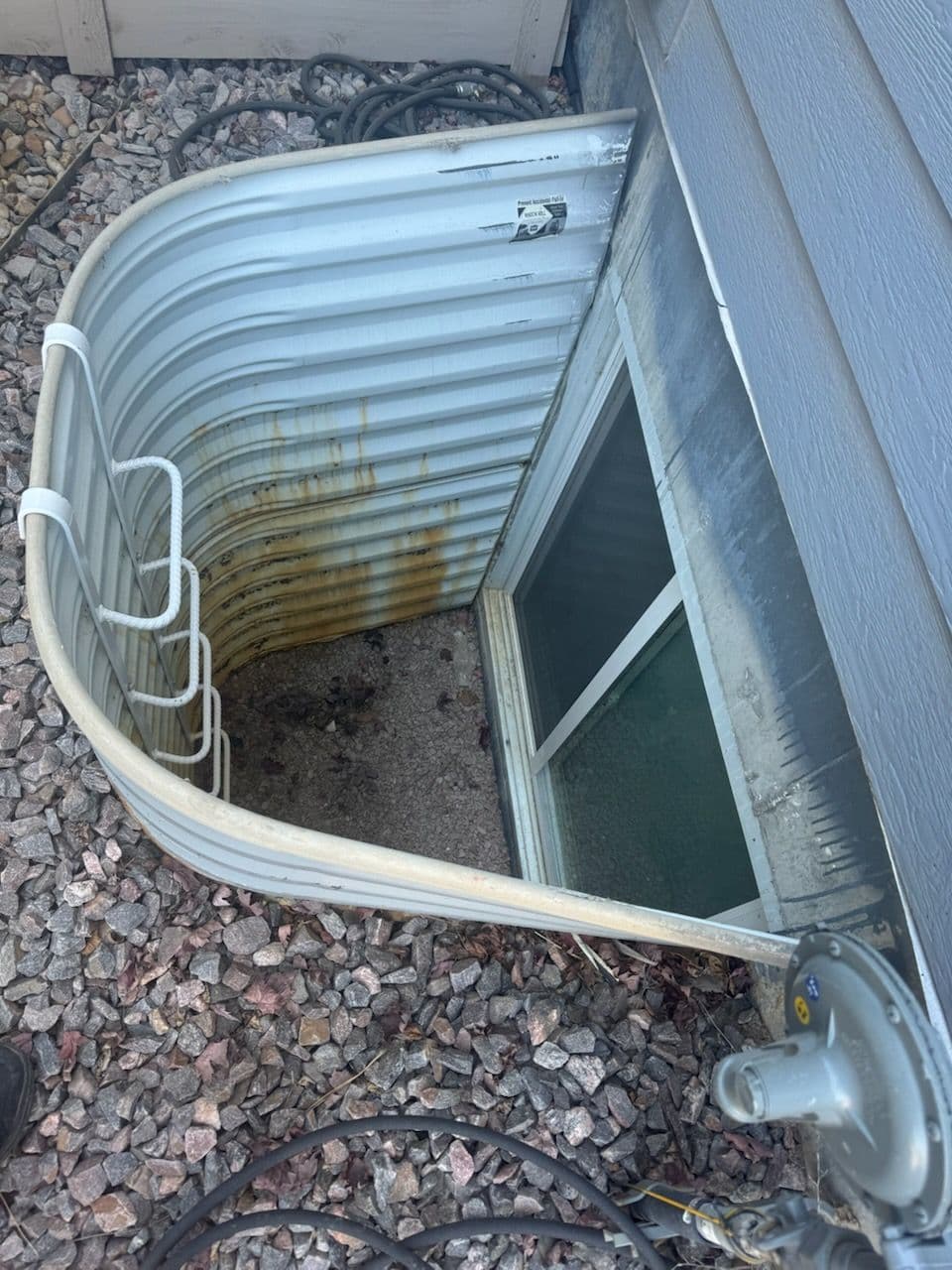 Gallery photos for Revamping Rusty Window Wells for a Safer Home in Colorado: Image #2