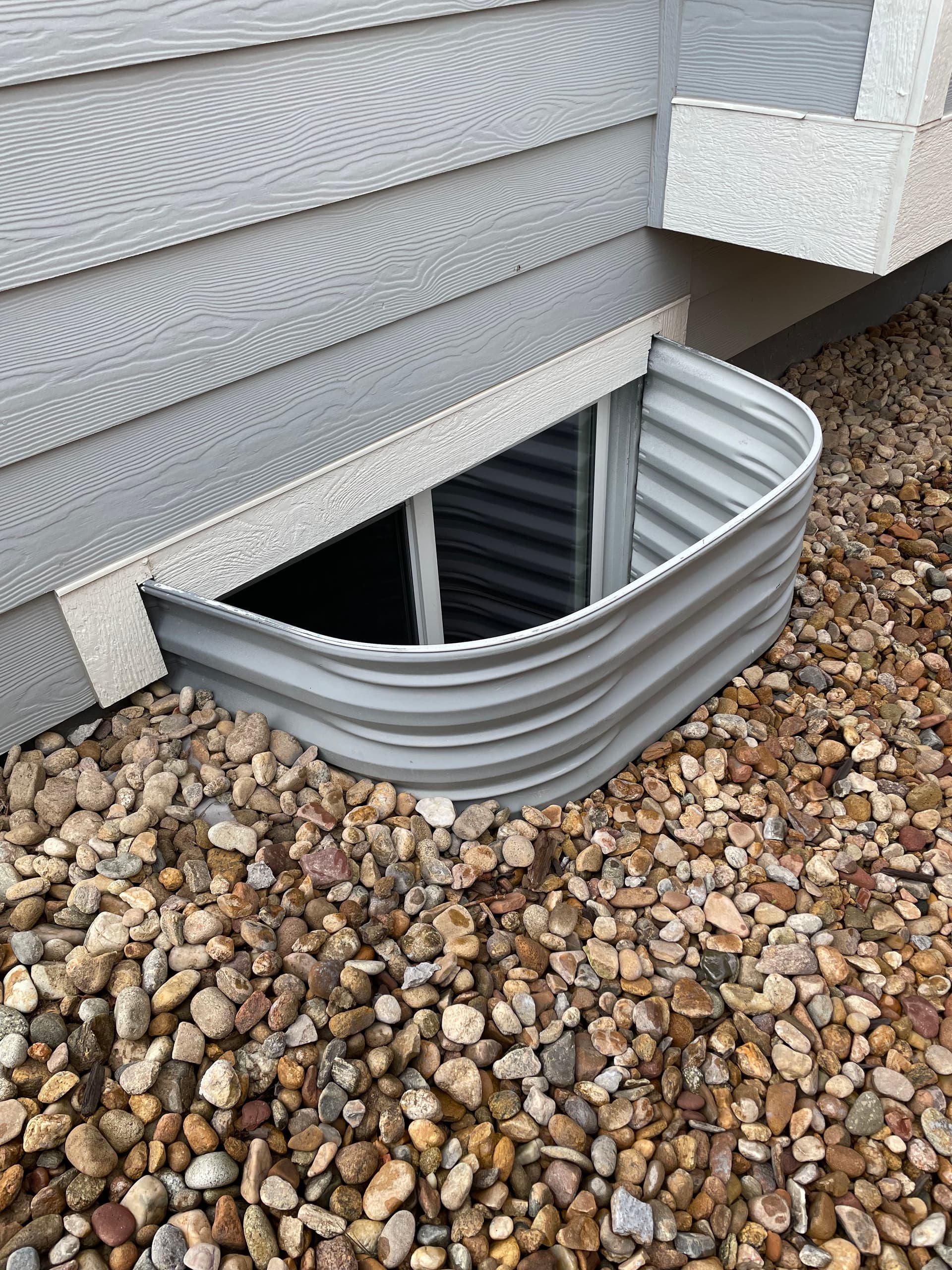 Window Well Replacements, New Covers, and Slope Correction Done Right image