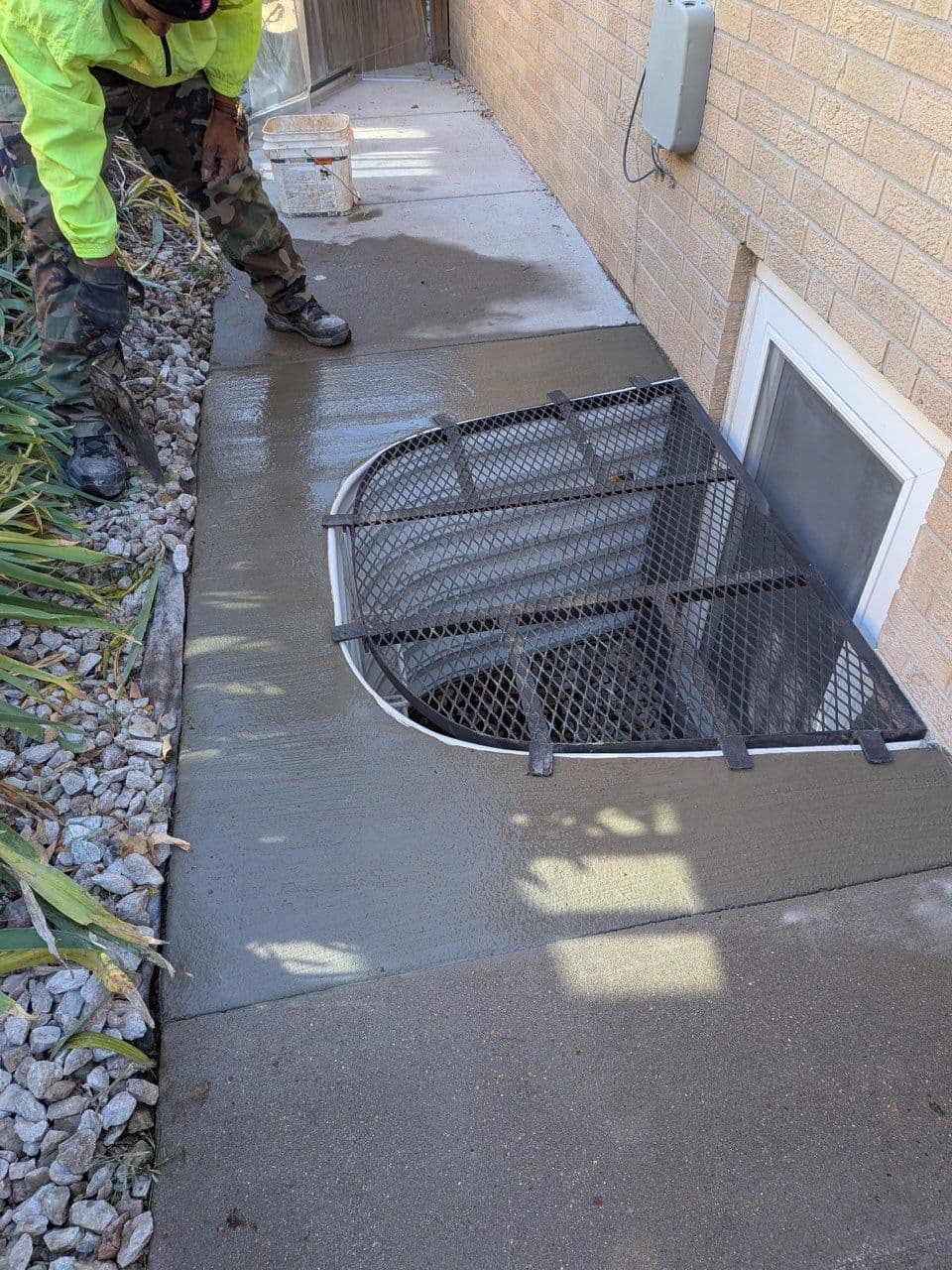 Gallery photos for Securing Homes with Window Well and Concrete Repair: Image #1