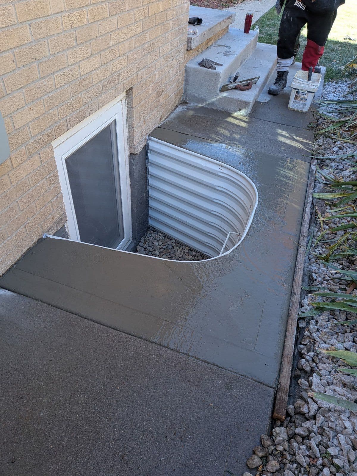 Gallery photos for Basement Window Well Makeover with Fresh Concrete: Image #1